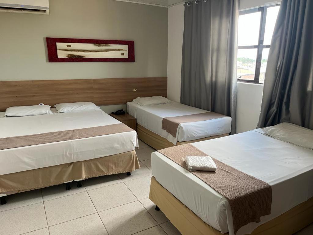 Larison Economy Hotel ปอร์โตเวโล ภายนอก รูปภาพ